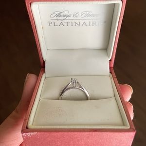 Platinaire solitaire diamond 1/12CTW ring (sz 7)
